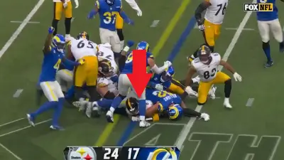 Kenny Pickett down on the field