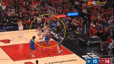 Nikola Vucevic dunks on Chet Holmgren