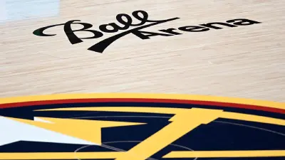 The logo of the Denver Nuggets at center court