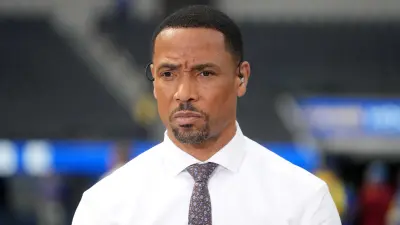 Rodney Harrison in a shirt and tie