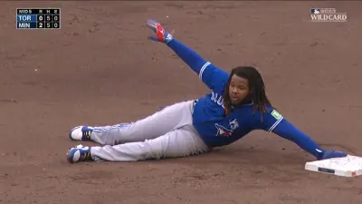 Vlad Guerrero Jr touching second base