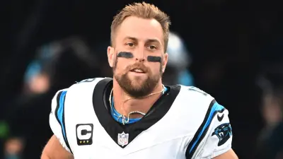 Adam Thielen runs onto the field