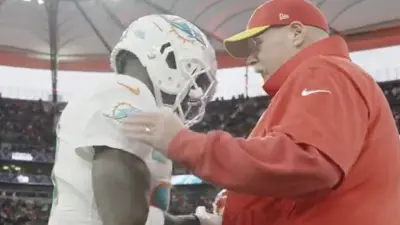 Tyreek Hill greets Andy Reid