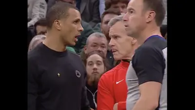Bulls coach Billy Donovan staring at Celtics coach Joe Mazzulla