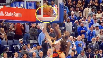 Draymond Green and Josh Giddey both goaltend a shot from Warriors star Steph Curry