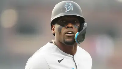 Jorge Soler looks on