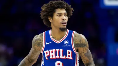Kelly Oubre dribbles the ball up the court