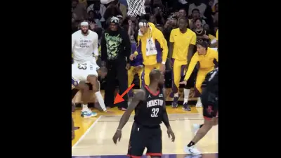 LeBron James doing the "too small" gesture toward Dillon Brooks
