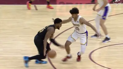 Lakers wing Max Christie defending Donovan Mitchell
