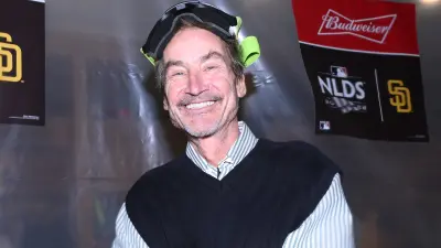 Peter Seidler celebrates in the clubhouse