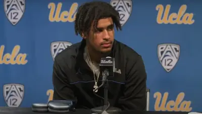 Dante Moore at the podium