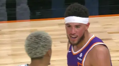 Devin Booker talking trash to Jeremy Sochan
