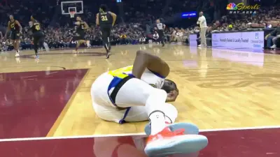 Draymond Green on the ground in pain