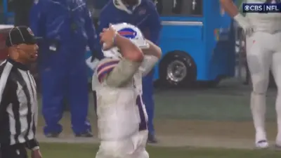 Josh Allen with hands on his head
