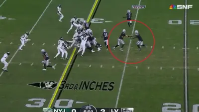 Josh Jacobs takes a handoff