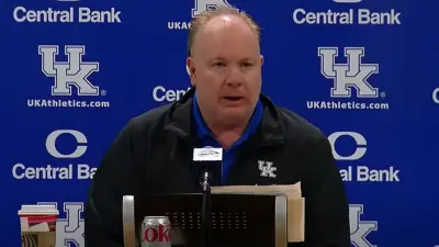 Mark Stoops at the podium