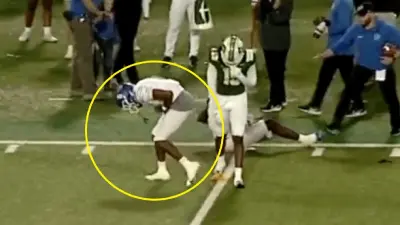 A Memphis WR doubled over in pain