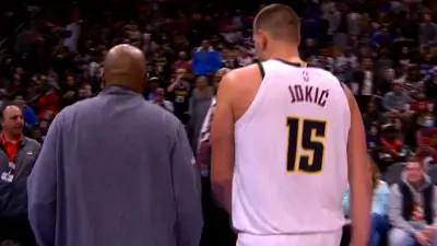Nikola Jokic walking off the court