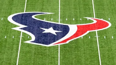 The Houston Texans logo at midfield