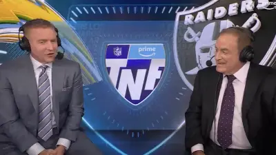 Kirk Herbstreit and Al Michaels in the broadcast booth