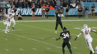 Jaguars defensive end Josh Allen intercepts a Bengals pass