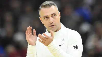 Raptors coach Darko Rajakovic clapping