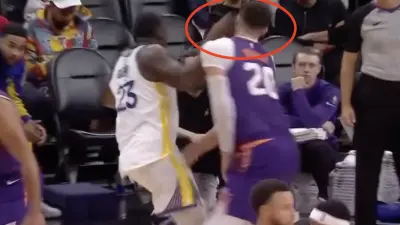 Draymond Green striking Jusuf Nurkic during a Suns-Warriors game
