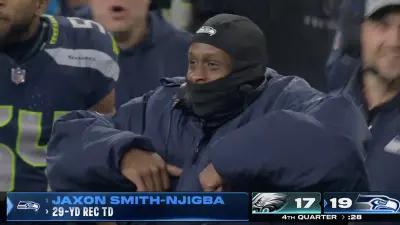 Seahawks QB Geno Smith celebrating after a Drew Lock TD drive