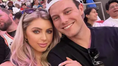 Jake Bailey and his girlfriend pose for a photo