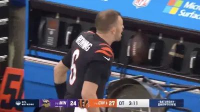 Jake Browning screaming on the sidelines after Bengals beat Vikings