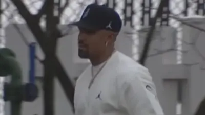 Jalen Hurts arrives to a game
