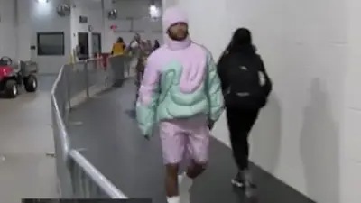 Kyler Murray wears a pink outfit
