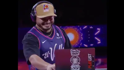 Suns DJ playing a song featuring Warriors coach Steve Kerr