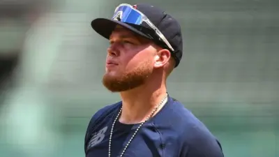 Alex Verdugo looking on