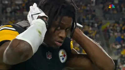 George Pickens covering his ears