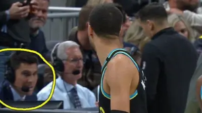 Tyrese Haliburton staring down Wally Szczerbiak