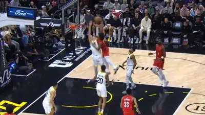 Walker Kessler dunked on