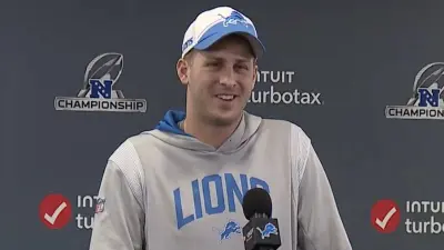 Jared Goff laughs at a press conference