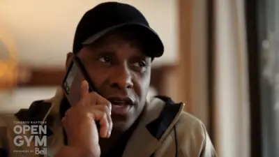 Masai Ujiri on the phone with Raptors guard Immanuel Quickley