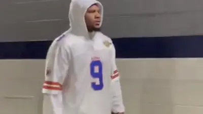 Micah Parsons wears a Bobby Boucher jersey