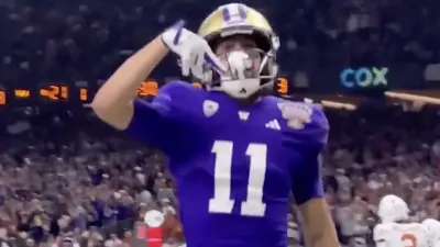 Jalen McMillan flashes the horns down gesture