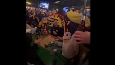 Connor Stalions at a bar