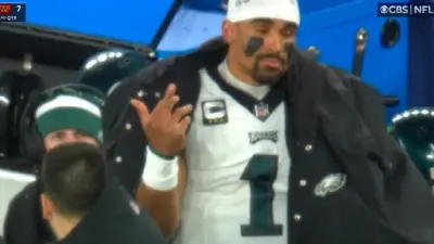 Jalen Hurts holds up his finger