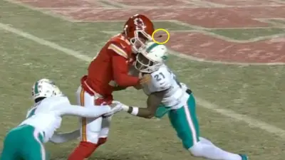 Patrick Mahomes' helmet breaking