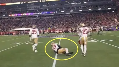 Dre Greenlaw goes down with an injury