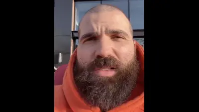 Reds free agent Joey Votto in an orange hoodie