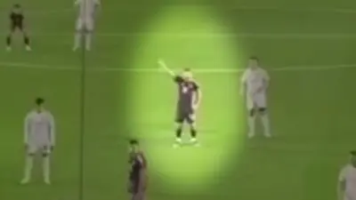 Lionel Messi signaling with his arm
