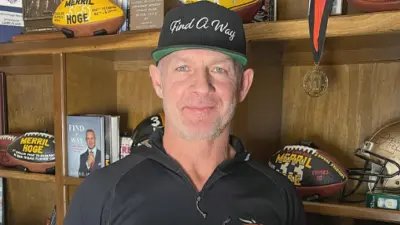 Merrill Hoge in a hat
