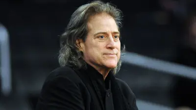 Richard Lewis looking on