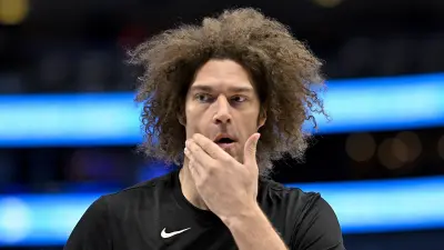 Robin Lopez touching his face